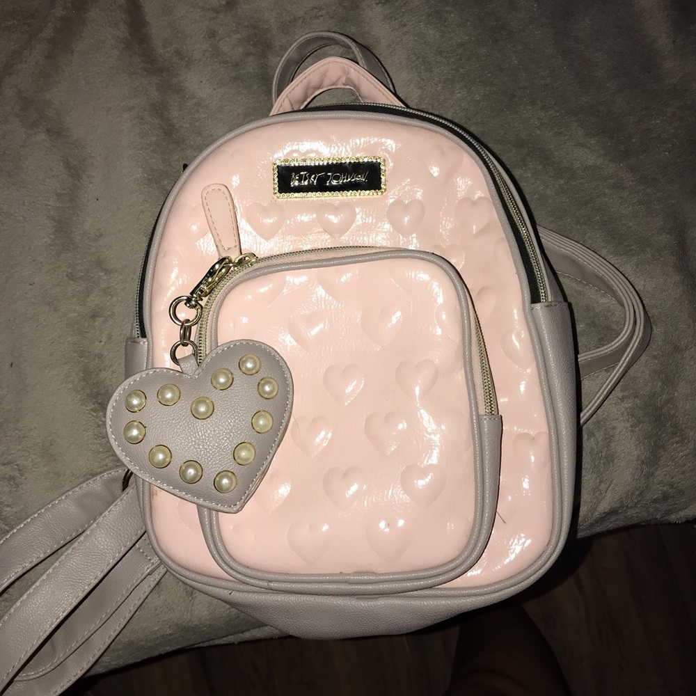 Very cute mini backpack, With cute floral inside!